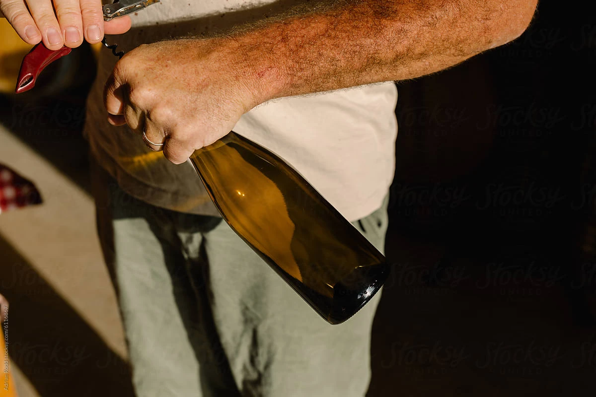 Opening a bottle of Spacedog wine